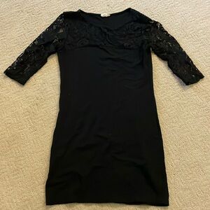 Yelete black 3/4 sleeve mini dress. Size M. Tight fitting.